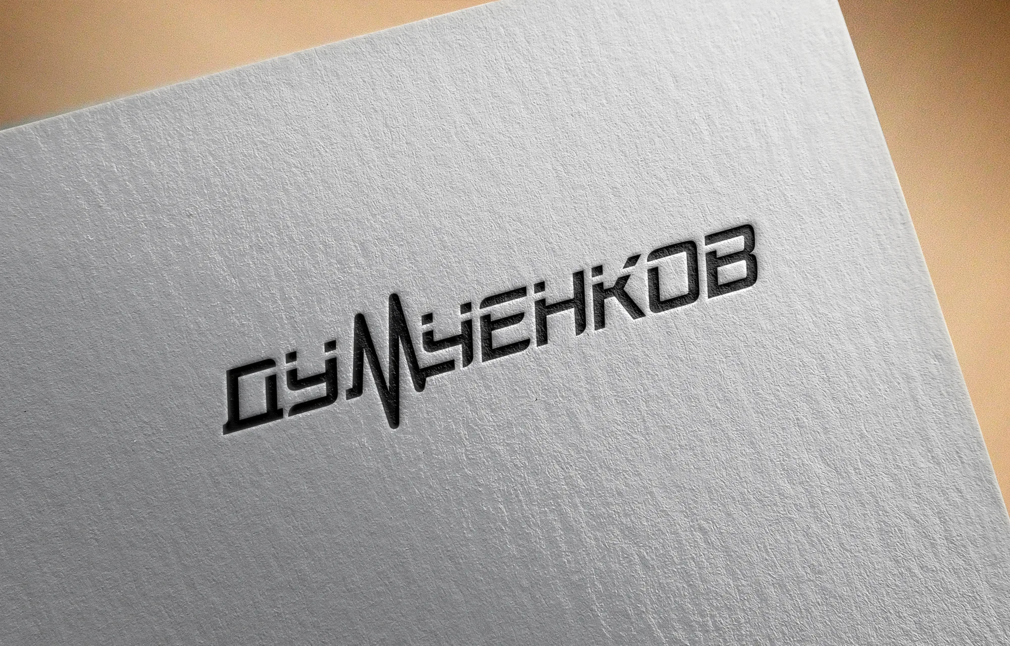 Логотип Dumchenkov на фактурной бумаге